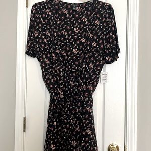 Wrap black floral dress. New with tags. Never worn. Size 3x
